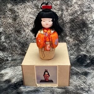 Traditional Japanese Doll with Orange Kimono